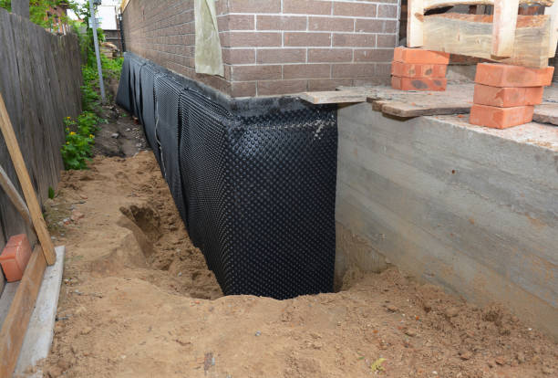 Happy homeowners after waterproofing job in Mineral Springs